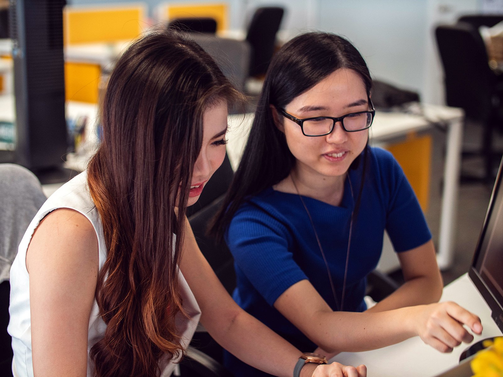 Two people talking and learning together